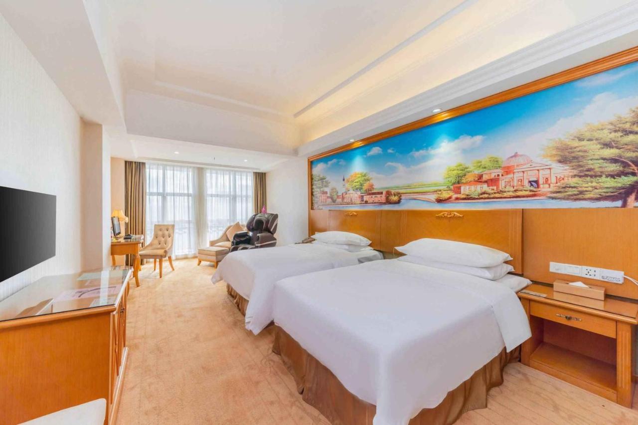 Vienna Hotel Shiyan Guangming Road شينزين المظهر الخارجي الصورة